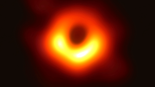 An artistic representation of a black hole in space